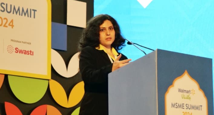 Najma Hashmi speaking at a conference